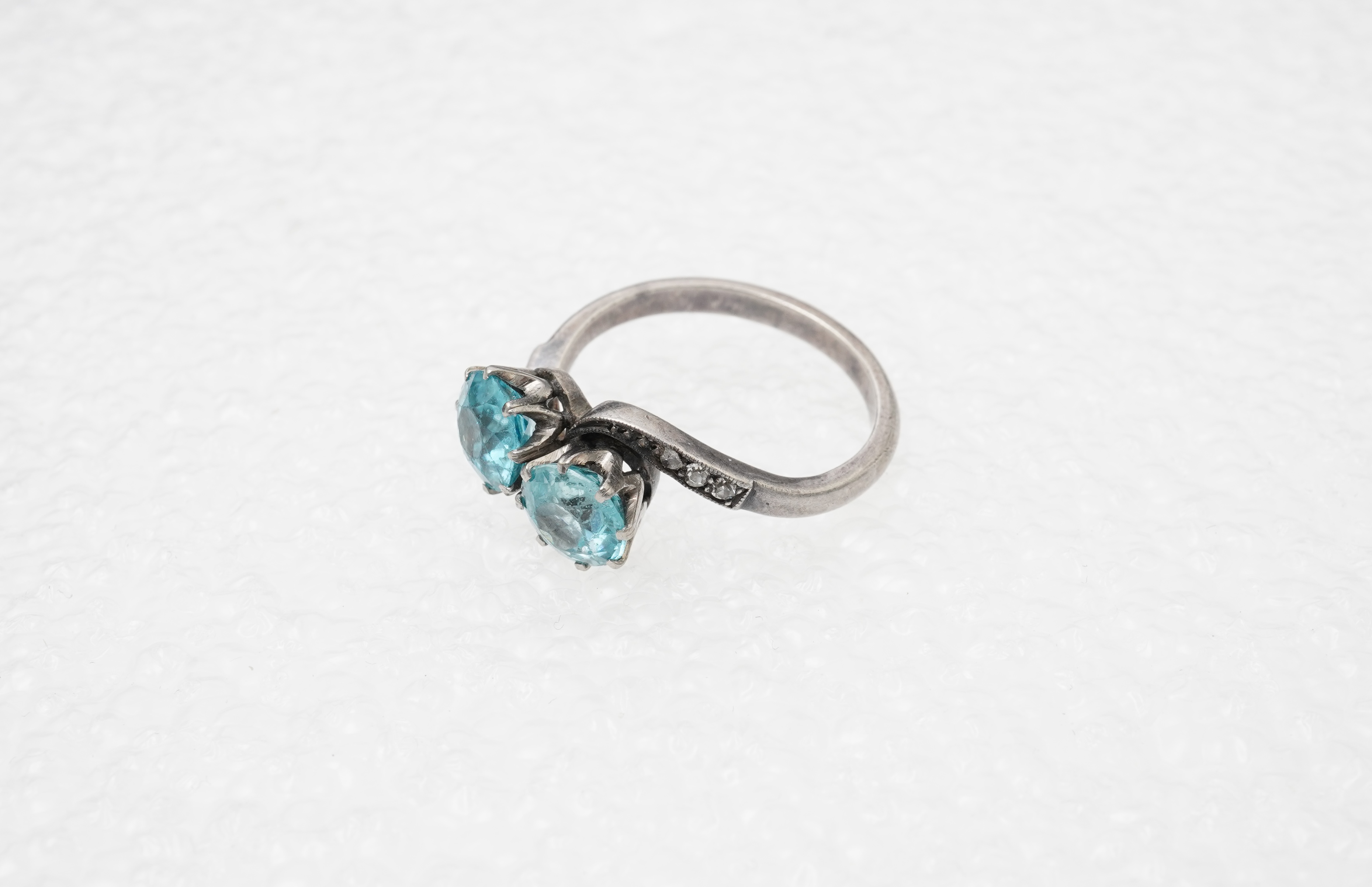 A zircon and diamond 'toi-et-moi' ring